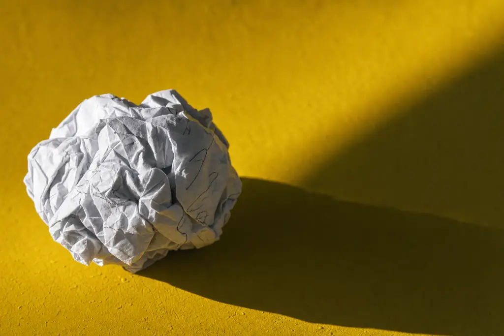 Dark still life on slate, the cover for the course Why Your AI Output Looks Like Garbage